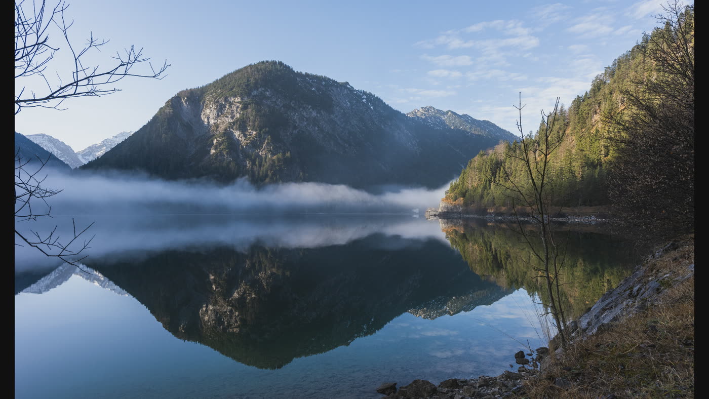 Lake Plansee below a forested mountain, encoded at 3840 by 2160 and captured over USB
